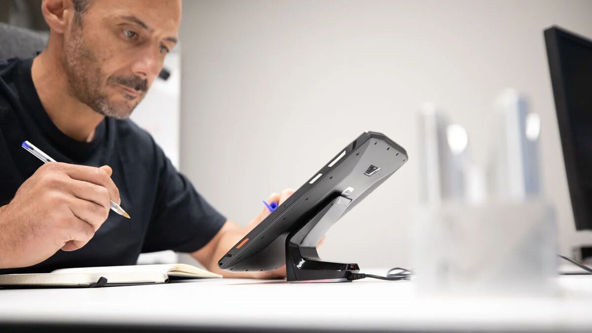 A man work with tablet Crosscall